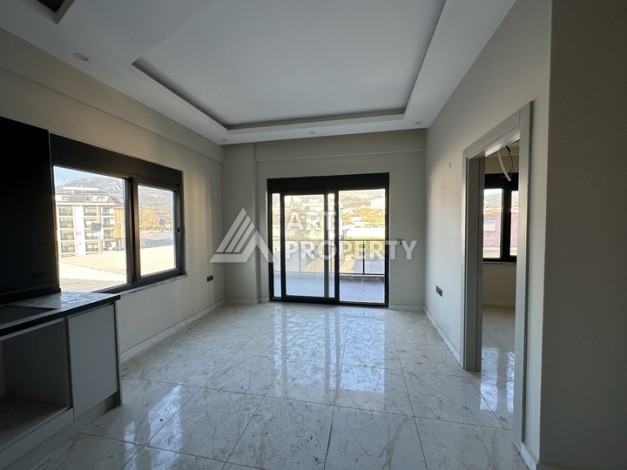 Квартира 1+1 в Каргыджаке, Алания — 350 м до моря - Ракурс 1