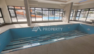Квартира 1+1 в Махмутларе, 60 кв.м. Новый элитный ЖК - Ракурс 2
