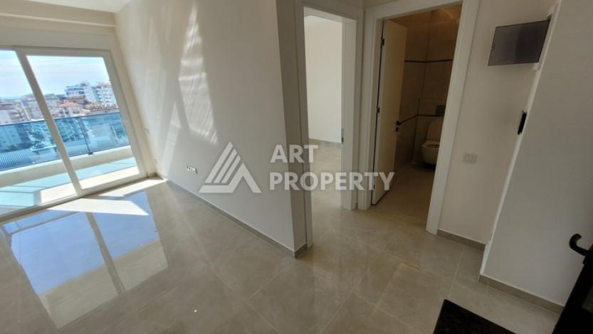 Квартира 1+1 в Махмутларе, 60 кв.м. Новый элитный ЖК - Ракурс 5