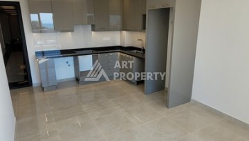 Квартира 1+1 в Махмутларе, 60 кв.м. Новый элитный ЖК - Ракурс 9