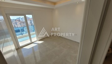 Квартира 1+1 в Махмутларе, 60 кв.м. Новый элитный ЖК - Ракурс 11