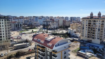 Квартира 1+1 в Махмутларе, 60 кв.м. Новый элитный ЖК - Ракурс 17