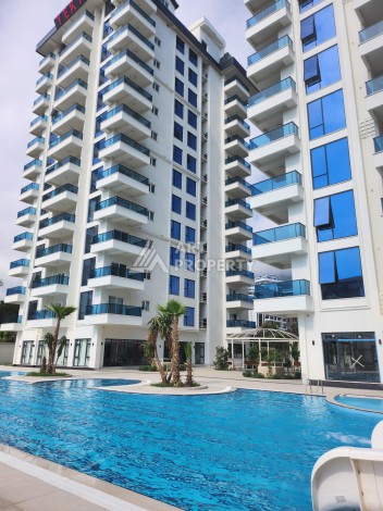 Квартира 1+1 в Махмутларе, 60 кв.м. Новый элитный ЖК - Ракурс 31