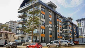 Квартира 1+1 в центре Махмутлара - 55 кв.м. Новый ЖК - Ракурс 1