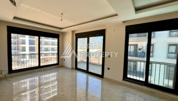 Квартира 1+1 в центре Махмутлара - 55 кв.м. Новый ЖК - Ракурс 3