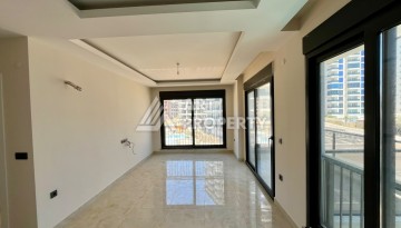 Квартира 1+1 в центре Махмутлара - 55 кв.м. Новый ЖК - Ракурс 6
