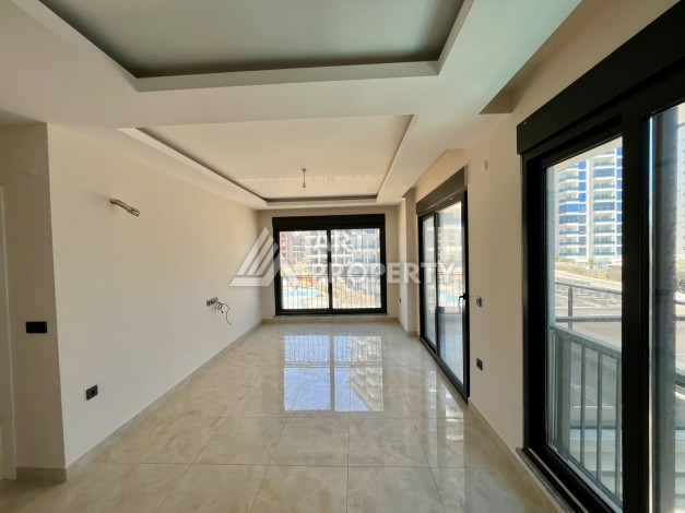 Квартира 1+1 в центре Махмутлара - 55 кв.м. Новый ЖК - Ракурс 5