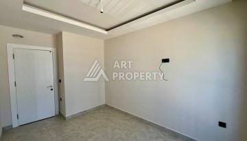 Квартира 1+1 в центре Махмутлара - 55 кв.м. Новый ЖК - Ракурс 9