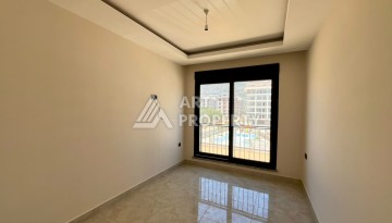 Квартира 1+1 в центре Махмутлара - 55 кв.м. Новый ЖК - Ракурс 11