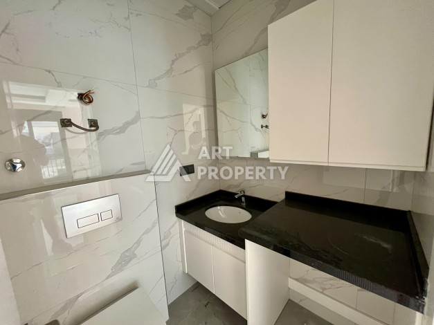 Квартира 1+1 в центре Махмутлара - 55 кв.м. Новый ЖК - Ракурс 11