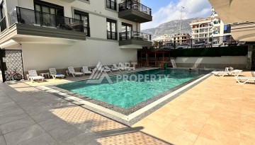 Квартира 1+1 в центре Махмутлара - 55 кв.м. Новый ЖК - Ракурс 13