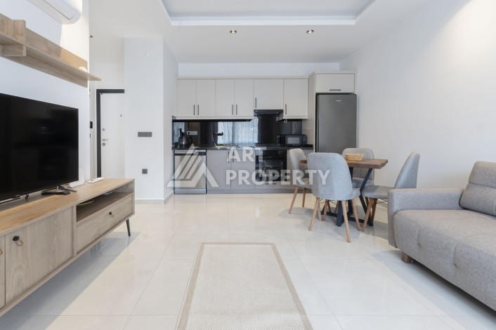 Меблированная квартира 1+1 в центре Махмутлара, 55 кв.м. - Ракурс 2