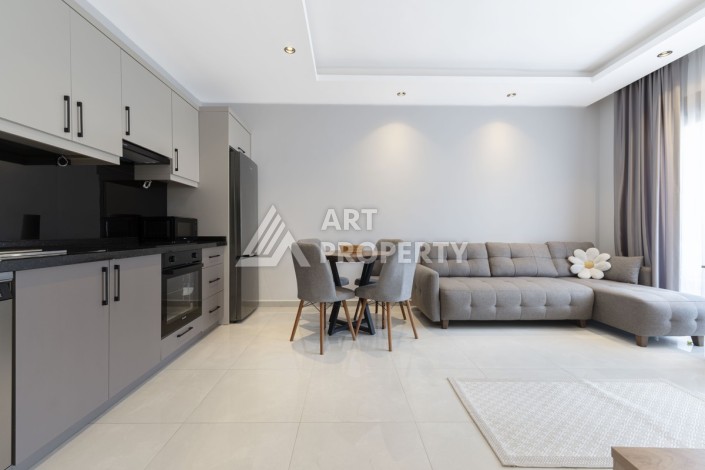 Меблированная квартира 1+1 в центре Махмутлара, 55 кв.м. - Ракурс 3