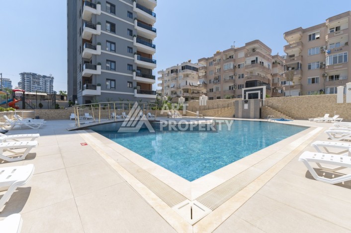 Меблированная квартира 1+1 в центре Махмутлара, 55 кв.м. - Ракурс 11
