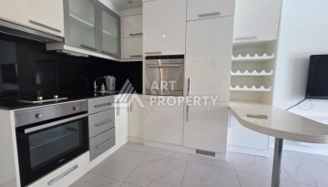 Квартира 1+1 в центре Алании, ЖК с инфраструктурой отельного типа - Ракурс 2