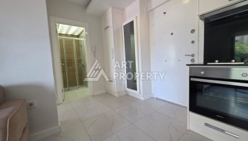 Квартира 1+1 в центре Алании, ЖК с инфраструктурой отельного типа - Ракурс 6