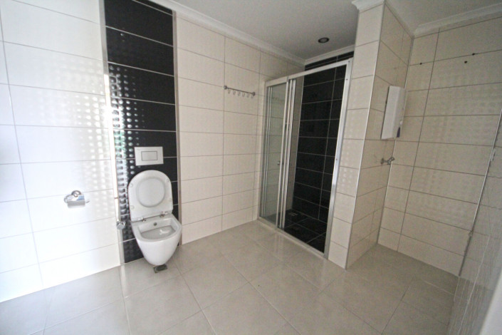 Квартира 3+1 с отдельной кухней в районе Махмутлар, 150 м2 - Ракурс 23