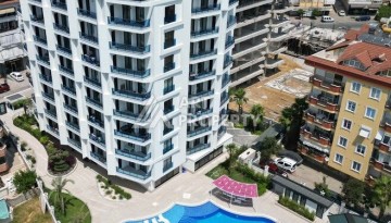 Квартира 1+1 в центре Алании в элитной резиденции, 58 м² - Ракурс 2