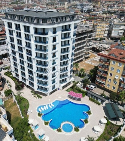 Квартира 1+1 в центре Алании в элитной резиденции, 58 м² - Ракурс 1