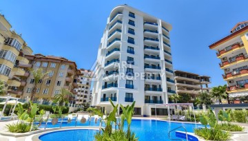 Квартира 1+1 в центре Алании в элитной резиденции, 58 м² - Ракурс 1