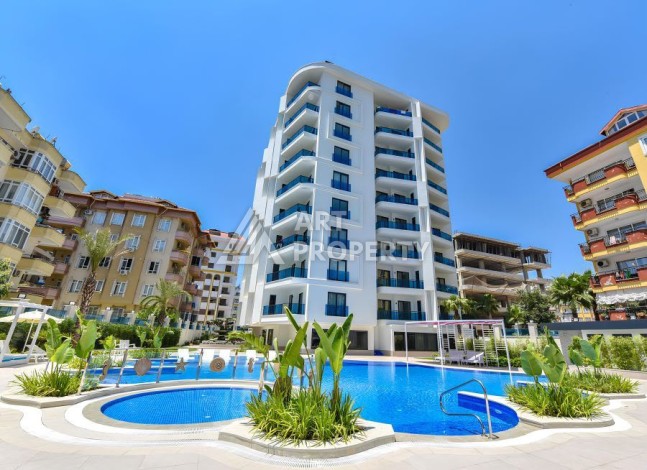 Квартира 1+1 в центре Алании в элитной резиденции, 58 м² - Ракурс 0