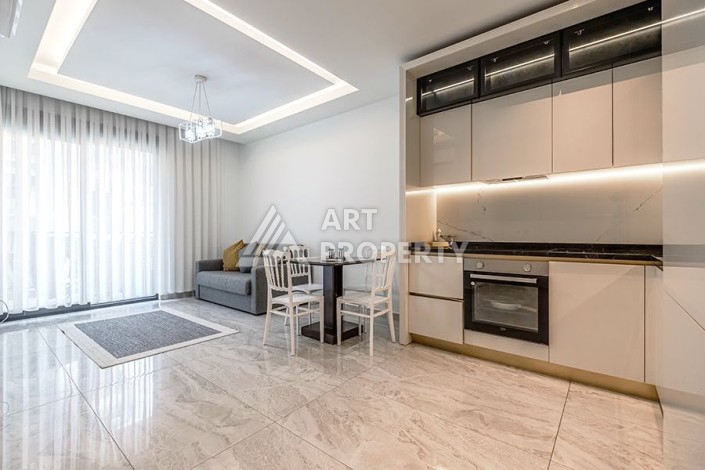 Квартира 1+1 в центре Алании в элитной резиденции, 58 м² - Ракурс 3