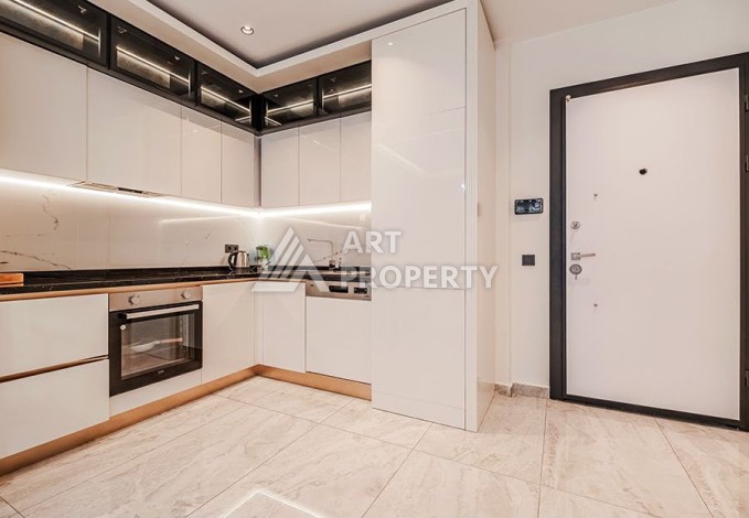 Квартира 1+1 в центре Алании в элитной резиденции, 58 м² - Ракурс 5