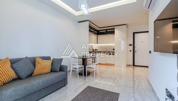 Квартира 1+1 в центре Алании в элитной резиденции, 58 м² - Ракурс 7