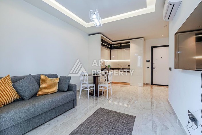 Квартира 1+1 в центре Алании в элитной резиденции, 58 м² - Ракурс 6