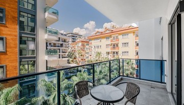 Квартира 1+1 в центре Алании в элитной резиденции, 58 м² - Ракурс 11