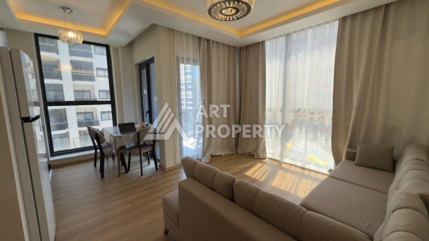 Квартира 1+1 в центре Махмутлара, 60 м² - Ракурс 1