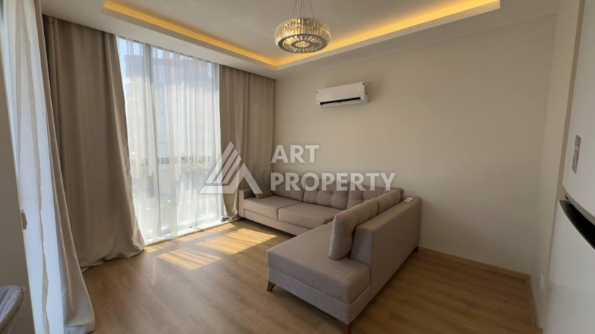 Квартира 1+1 в центре Махмутлара, 60 м² - Ракурс 4