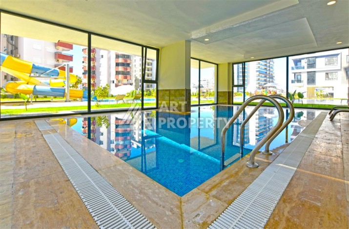 Квартира 1+1 в центре Махмутлара, 60 м² - Ракурс 32