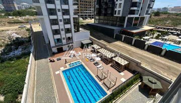 Квартира 1+1 в Махмутларе рядом с субботним рынком, 50 м² - Ракурс 1