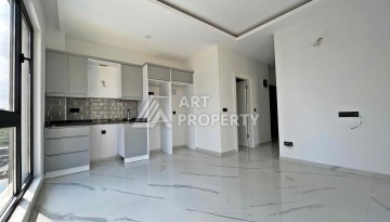 Квартира 1+1 в Махмутларе рядом с субботним рынком, 50 м² - Ракурс 4