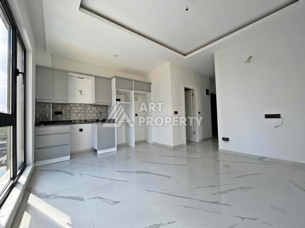 Квартира 1+1 в Махмутларе рядом с субботним рынком, 50 м² - Ракурс 3