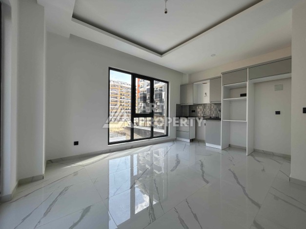 Квартира 1+1 в Махмутларе рядом с субботним рынком, 50 м² - Ракурс 5