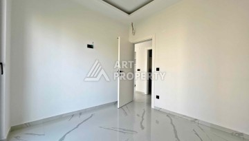 Квартира 1+1 в Махмутларе рядом с субботним рынком, 50 м² - Ракурс 7