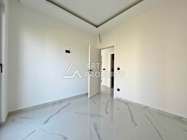 Квартира 1+1 в Махмутларе рядом с субботним рынком, 50 м² - Ракурс 6