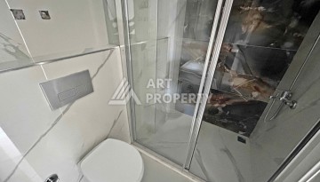 Квартира 1+1 в Махмутларе рядом с субботним рынком, 50 м² - Ракурс 11