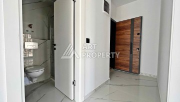 Квартира 1+1 в Махмутларе рядом с субботним рынком, 50 м² - Ракурс 12