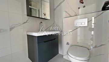 Квартира 1+1 в Махмутларе рядом с субботним рынком, 50 м² - Ракурс 13