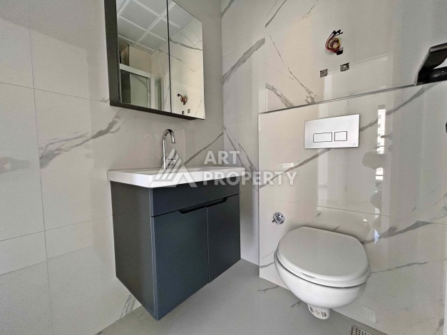 Квартира 1+1 в Махмутларе рядом с субботним рынком, 50 м² - Ракурс 12