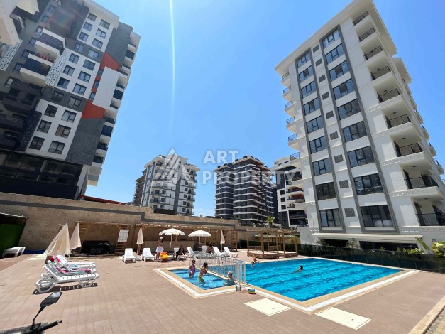 Квартира 1+1 в Махмутларе рядом с субботним рынком, 50 м² - Ракурс 17