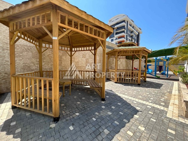 Квартира 1+1 в Махмутларе рядом с субботним рынком, 50 м² - Ракурс 21