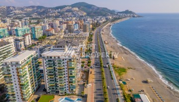 Квартира 2+1 на первой береговой линии в Махмутларе, 95 м² - Ракурс 1