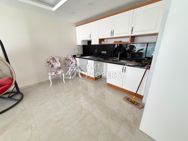 Квартира 2+1 на первой береговой линии в Махмутларе, 95 м² - Ракурс 1