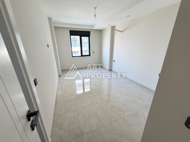 Квартира 2+1 на первой береговой линии в Махмутларе, 95 м² - Ракурс 6