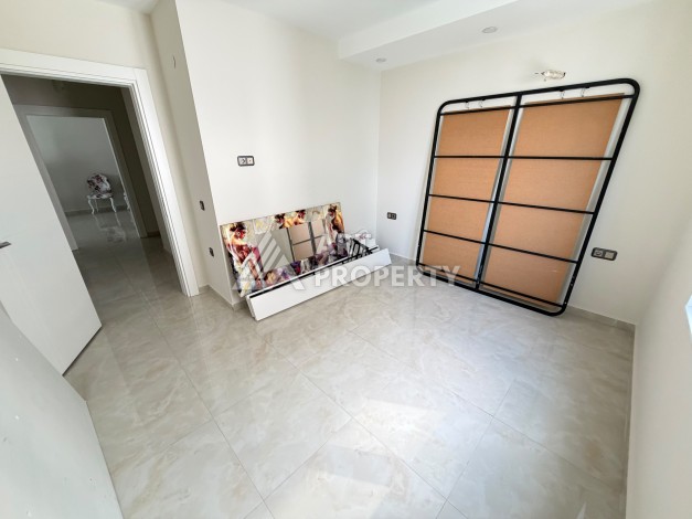 Квартира 2+1 на первой береговой линии в Махмутларе, 95 м² - Ракурс 9