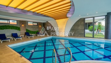 Квартира 2+1 на первой береговой линии в Махмутларе, 95 м² - Ракурс 21